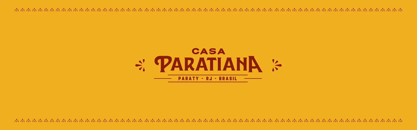 Logotipo Casa Paratiana sobre faixa amarela com ornamentos
