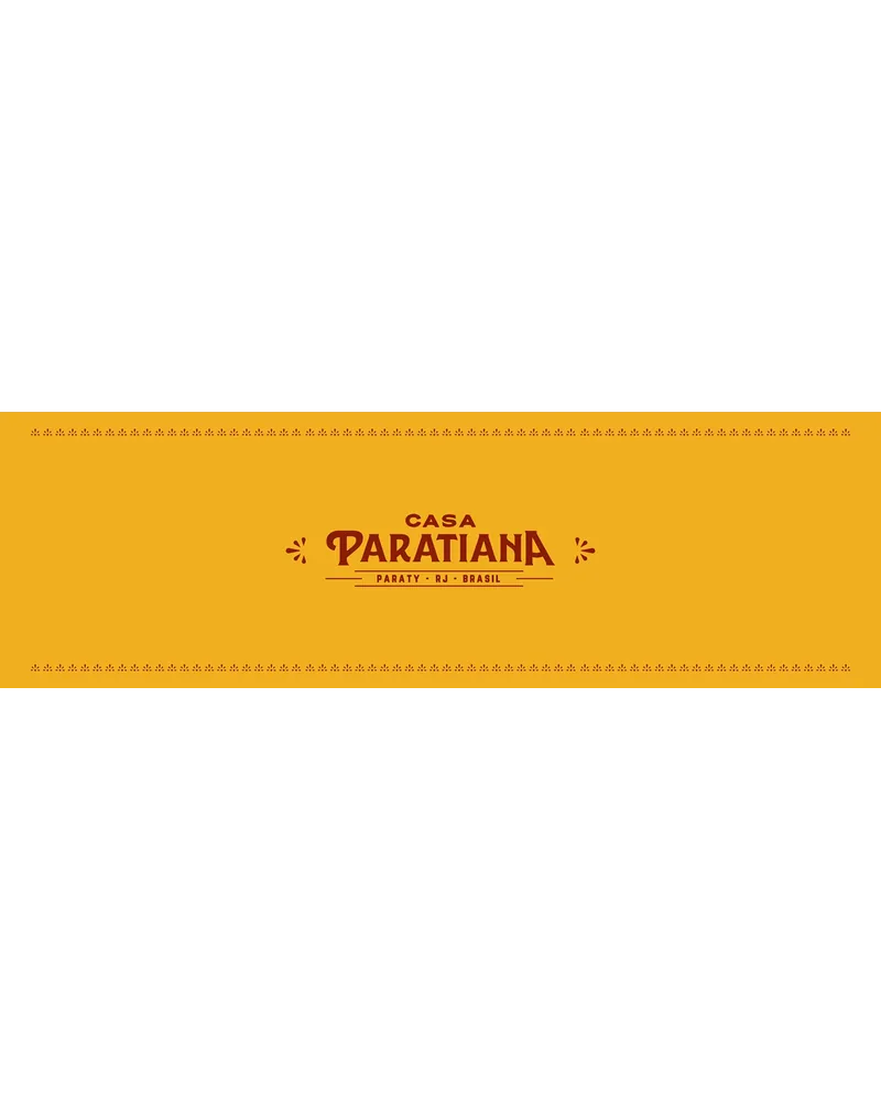 Logotipo Casa Paratiana sobre faixa amarela com ornamentos